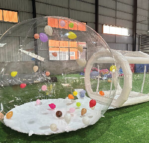 Bubble House Hire London clear inflatable dome with floating balloons for parties and events